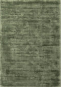 Green textured rug with abstract pattern