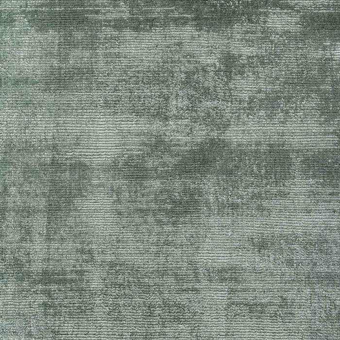 Textured green fabric pattern