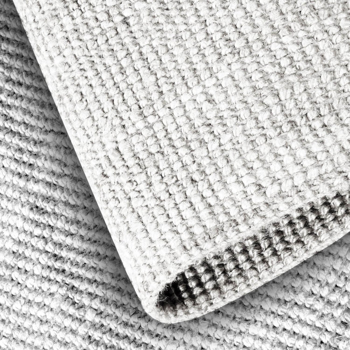 Close-up of textured fabric with a zipper