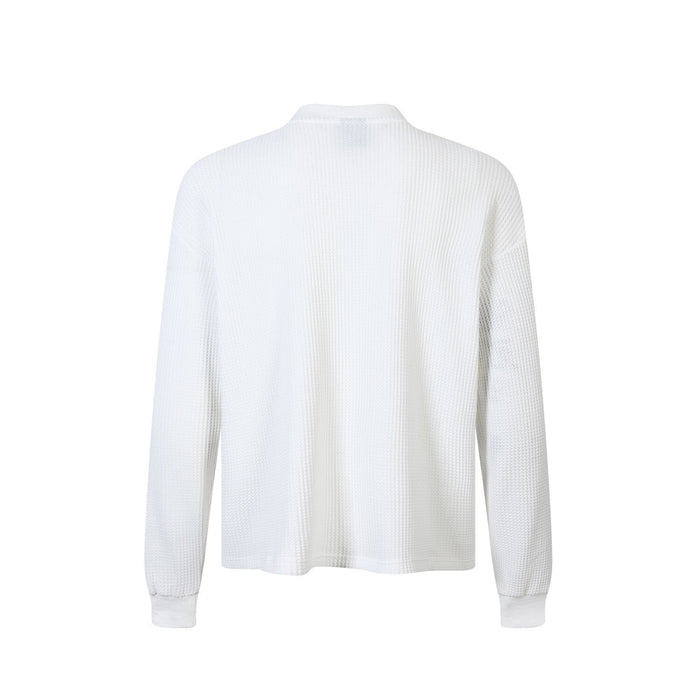 Back view of a white waffle knit long sleeve tee with plain textured finish
