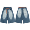 Front and back view of wide-leg washed grid denim shorts with orange contrast belt on white background