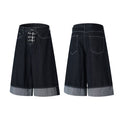Front and back view of dark wash wide-leg denim shorts with silver buckle hardware and cuffed hem