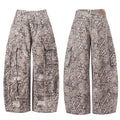 Front and back view of wide-leg leopard print cargo baggy jeans with multi utility flap pockets and distressed detailing