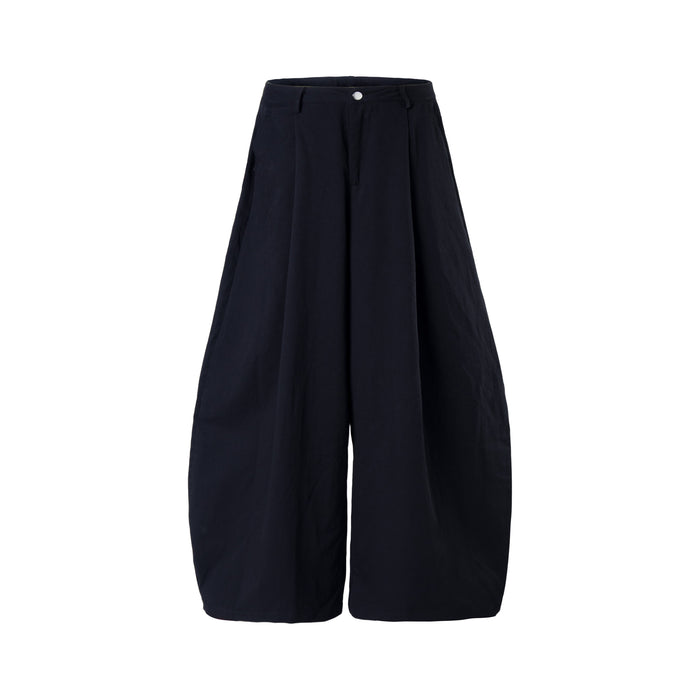 Black wide-leg cargo pants front view with snap-button waist and pleated legs