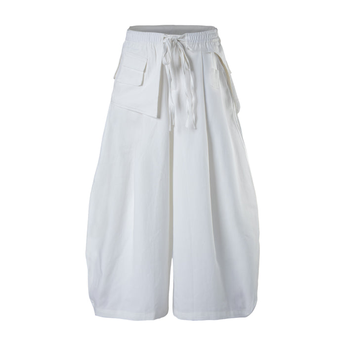 White wide-leg cargo pants front view with tie waist and layered flap pockets