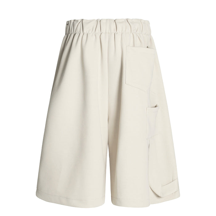 Cream wide-leg shorts back view with elastic waist and single back pocket