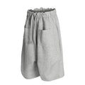 Gray wide-leg shorts front view with elastic waist, drawstring, and patch pockets