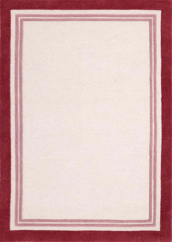 Rectangular area rug with a red border on a white background
