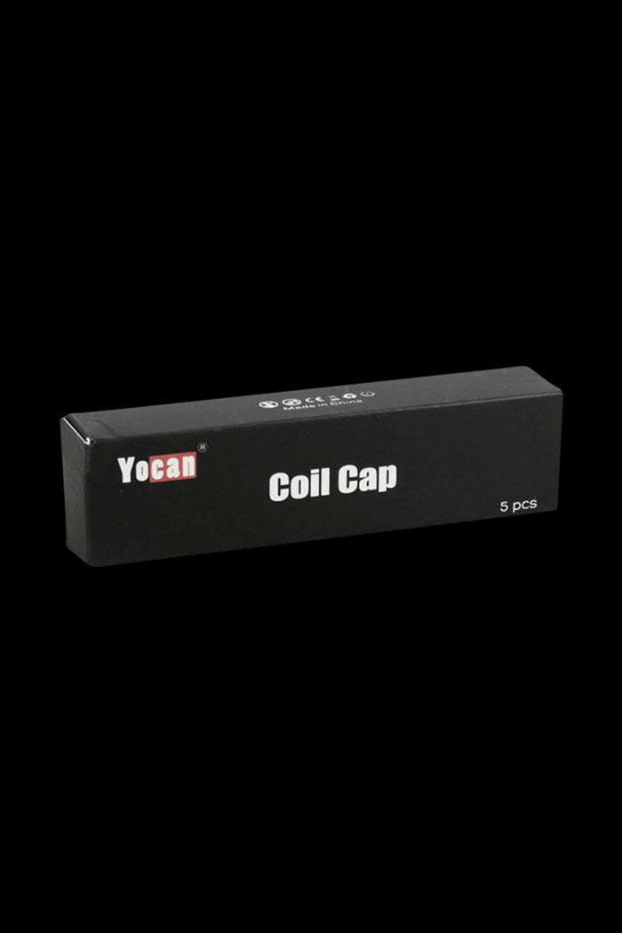 A close-up of the box containing Yocan Evolve Plus XL Coil Caps, displaying the packaging's branded design and contents.